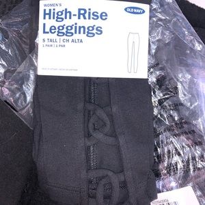 Small and tall black high waist cross leggings. Never worn.